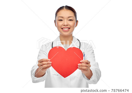 smiling asian female doctor holding red heart 78766474