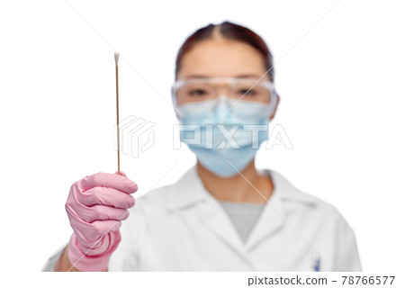 asian female doctor in mask with test cotton swab 78766577
