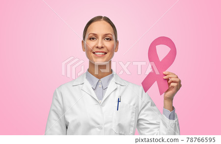 female doctor with breast cancer awareness ribbon female doctor with breast cancer awareness ribbon 78766595