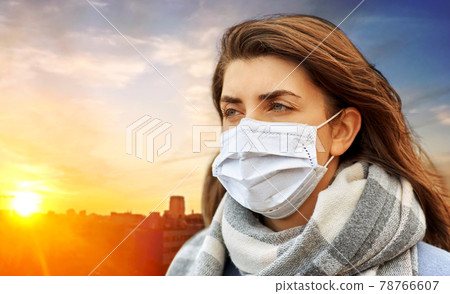young woman wearing protective medical mask young woman wearing protective medical mask 78766607
