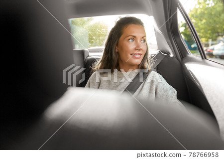 happy smiling woman or female passenger in car happy smiling woman or female passenger in car 78766958