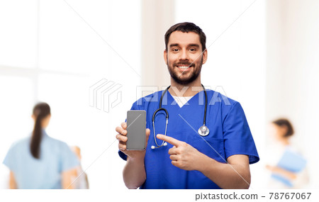 smiling doctor or male nurse with smartphone smiling doctor or male nurse with smartphone 78767067