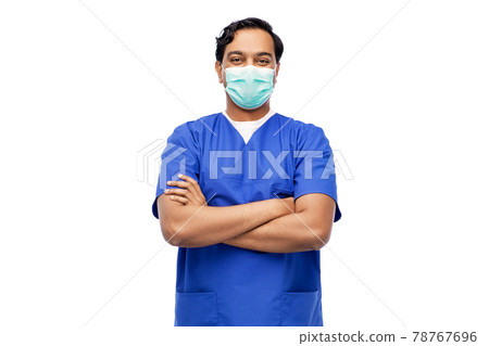 indian male doctor in blue uniform and mask indian male doctor in blue uniform and mask 78767696