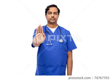 indian doctor or male nurse showing stop gesture indian doctor or male nurse showing stop gesture 78767703