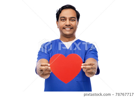 smiling male doctor with red heart on clipboard smiling male doctor with red heart on clipboard 78767717