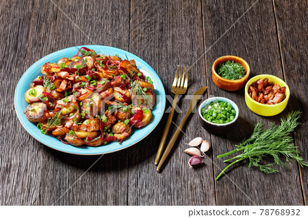 roast potato salad with red onion and bacon 78768932