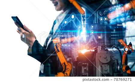 Mechanized industry robot arm and factory worker double exposure Mechanized industry robot arm and factory worker double exposure 78769271