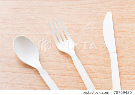 Plastic spoon, fork and knife 78769420