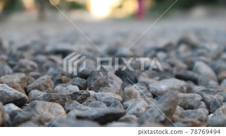 Texture of little stones in many shades of grey and white laying on ground. Stone floor texture for background. Crack Stone pattern at a construction site in Turkey Texture of little stones in many shades of grey and white laying on ground. Stone floor texture for background. Crack Stone pattern at a construction site in Turkey 78769494