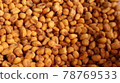 Vegan healthy roasted corn nuts background. Organic sauced corn texture at the spice bazaar in Turkey 78769533