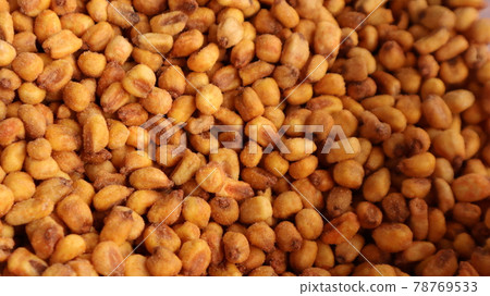 Vegan healthy roasted corn nuts background. Organic sauced corn texture at the spice bazaar in Turkey Vegan healthy roasted corn nuts background. Organic sauced corn texture at the spice bazaar in Turkey 78769533