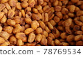 Vegan healthy roasted corn nuts background. Organic sauced corn texture at the spice bazaar in Turkey 78769534