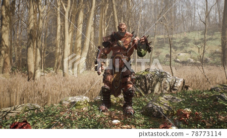 A formidable orc warrior lifts the severed head of a defeated enemy from the ground. Fantasy medieval concept. 3D Rendering. 78773114