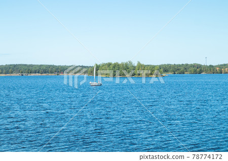 Yacht on the lake Saimaa on a sunny summer day, Lappeenranta, Finland 78774172