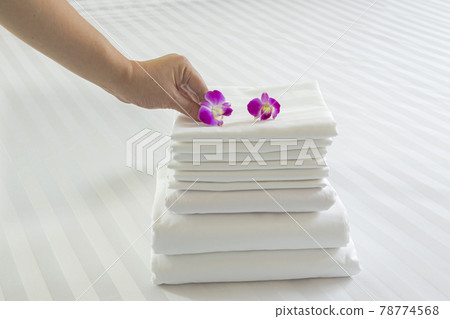 Duvet roll. down filled duvet rolled up isolated on white background Duvet roll. down filled duvet rolled up isolated on white background 78774568