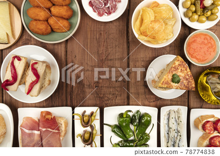 The food of Spain. Overhead photo of many different Spanish tapas with copy space The food of Spain. Overhead photo of many different Spanish tapas with copy space 78774838