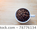 many coffee beans in the glass  78776134