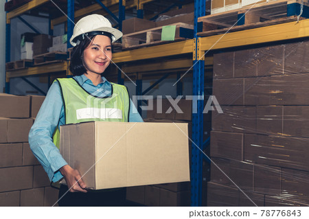 Portrait of young Asian woman warehouse worker smiling in the storehouse 78776843