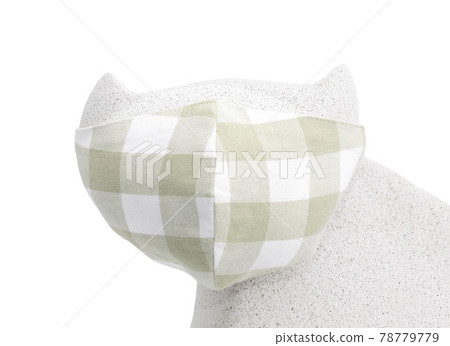 Face mask on cat figure face.Coronavirus preventive cotton mask. DIY concept. Face mask on cat figure face.Coronavirus preventive cotton mask. DIY concept. 78779779