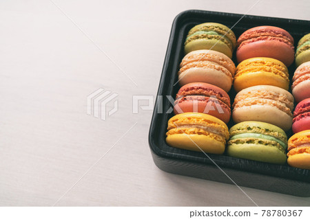 Macarons gift box cute assortment of yummy pastel colored macaron different flavours - pistachio, lemon, raspberry, vanilla 78780367
