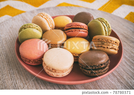 Macarons on plate 78780371
