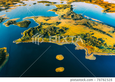 Braslaw Or Braslau, Vitebsk Voblast, Belarus. Aerial View Of Nedrava Lake And Green Forest Landscape In Sunny Autumn Morning. Top View Of Beautiful European Nature From High Attitude. Bird's Eye View Braslaw Or Braslau, Vitebsk Voblast, Belarus. Aerial View Of Nedrava Lake And Green Forest Landscape In Sunny Autumn Morning. Top View Of Beautiful European Nature From High Attitude. Bird's Eye View 78782328