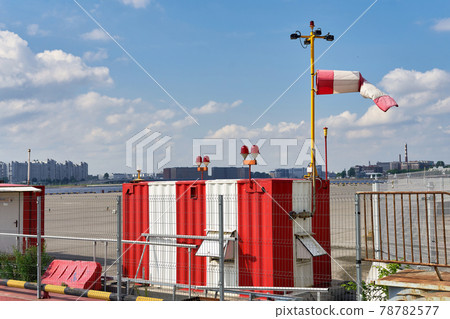 Weather station used by the meteorological service against a blue sky Weather station used by the meteorological service against a blue sky 78782577