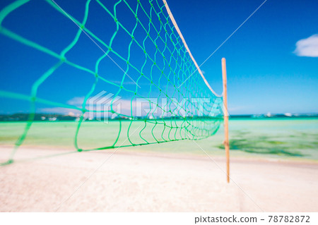 Closeup volleyball net at the empty tropical exotic beach Closeup volleyball net at the empty tropical exotic beach 78782872