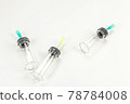 Glass bottle for vaccines on white background 78784008