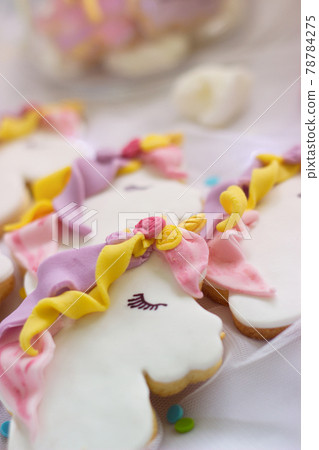 Unicorn royal icing cookies; food background 78784275