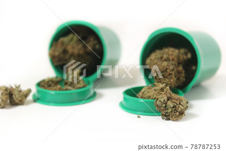 Legal Marijuana Buds and CBD Hemp Flowers With Green Leaf Legal Marijuana Buds and CBD Hemp Flowers With Green Leaf 78787253