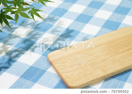 Background material: Blue plaid fabric and maple 78789302