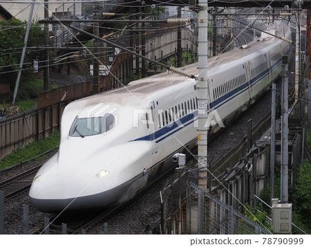 Shinkansen N700A near Yamashina in the rain Shinkansen N700A near Yamashina in the rain 78790999