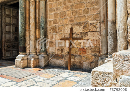 Wooden cross lean against the wall of the Holy Sepulchre church in Jerusalem. Wooden cross lean against the wall of the Holy Sepulchre church in Jerusalem. 78792008