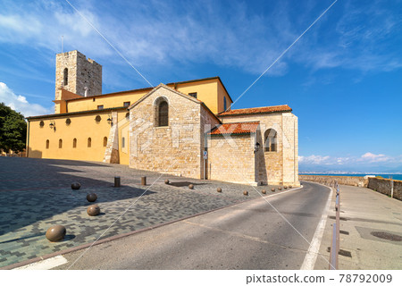 Antibes Cathedral and road along the sea in France. 78792009