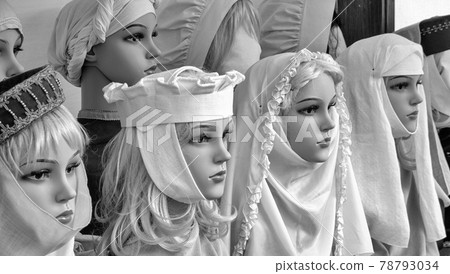 Doll heads with medieval veils and scarves to cover the hair, Christian tradition, Black and white, bw 78793034