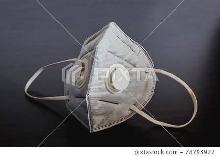 A mask and corona virus protection on background. A mask and corona virus protection on background. 78793922