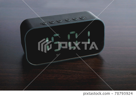Black Digital alarm clock on background. 78793924