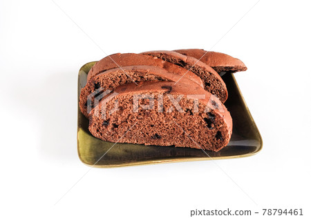 Slices of brown bread with sweet chocolate on white. Slices of brown bread with sweet chocolate on white. 78794461