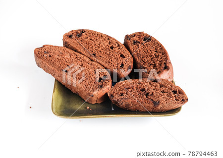 Slices of brown bread with sweet chocolate on white. Slices of brown bread with sweet chocolate on white. 78794463