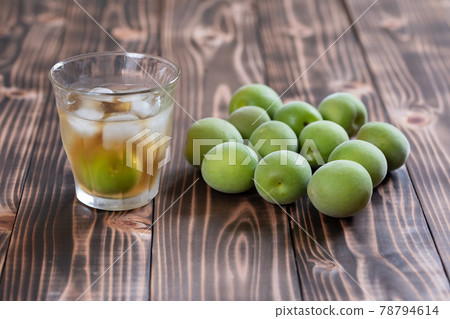 Homemade plum wine and ome poured into a glass 78794614