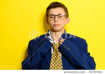 The child pretends to be an adult man, a children's theme on the theme of adult life. The child pretends to be an adult man, a children's theme on the theme of adult life. 78797461