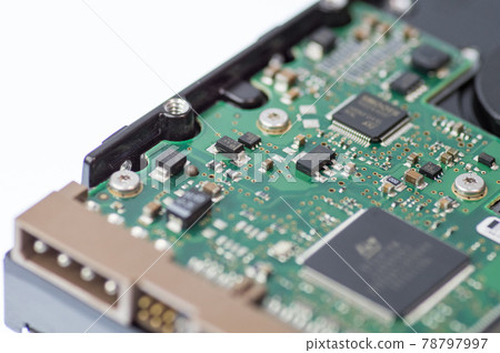 Close-up of electronic devices that use many semiconductors Close-up of electronic devices that use many semiconductors 78797997