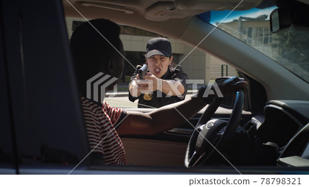 Police officers arresting African American driver Police officers arresting African American driver 78798321