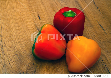View of fresh multi-colored peppers on the table. Healthy vegetables, healthy food, diet. 78801655