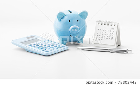 Piggy bank with calculator and calendar and pen 78802442