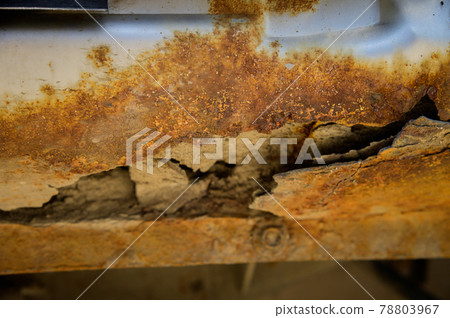 Fragment of a car body with rust. fragment of a rusty wing of a car. The body element is corroded. Concept: corrosion resistance, body repair, rust. Protection. Fragment of a car body with rust. fragment of a rusty wing of a car. The body element is corroded. Concept: corrosion resistance, body repair, rust. Protection. 78803967