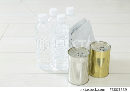 Emergency food lined up on the floor 78805889