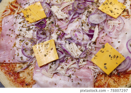 pizza close-up on the table 78807297