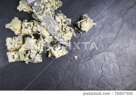 blue cheese diced close-up. food cheese 78807300
